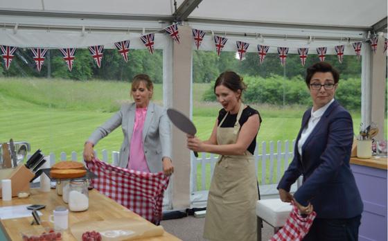 Great British Bake Off winner Candice wafting her creations with the ever-helpful Mel and Sue