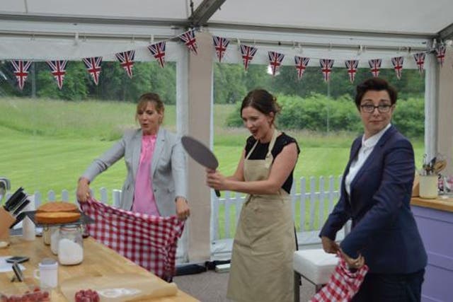 Great British Bake Off winner Candice wafting her creations with the ever-helpful Mel and Sue
