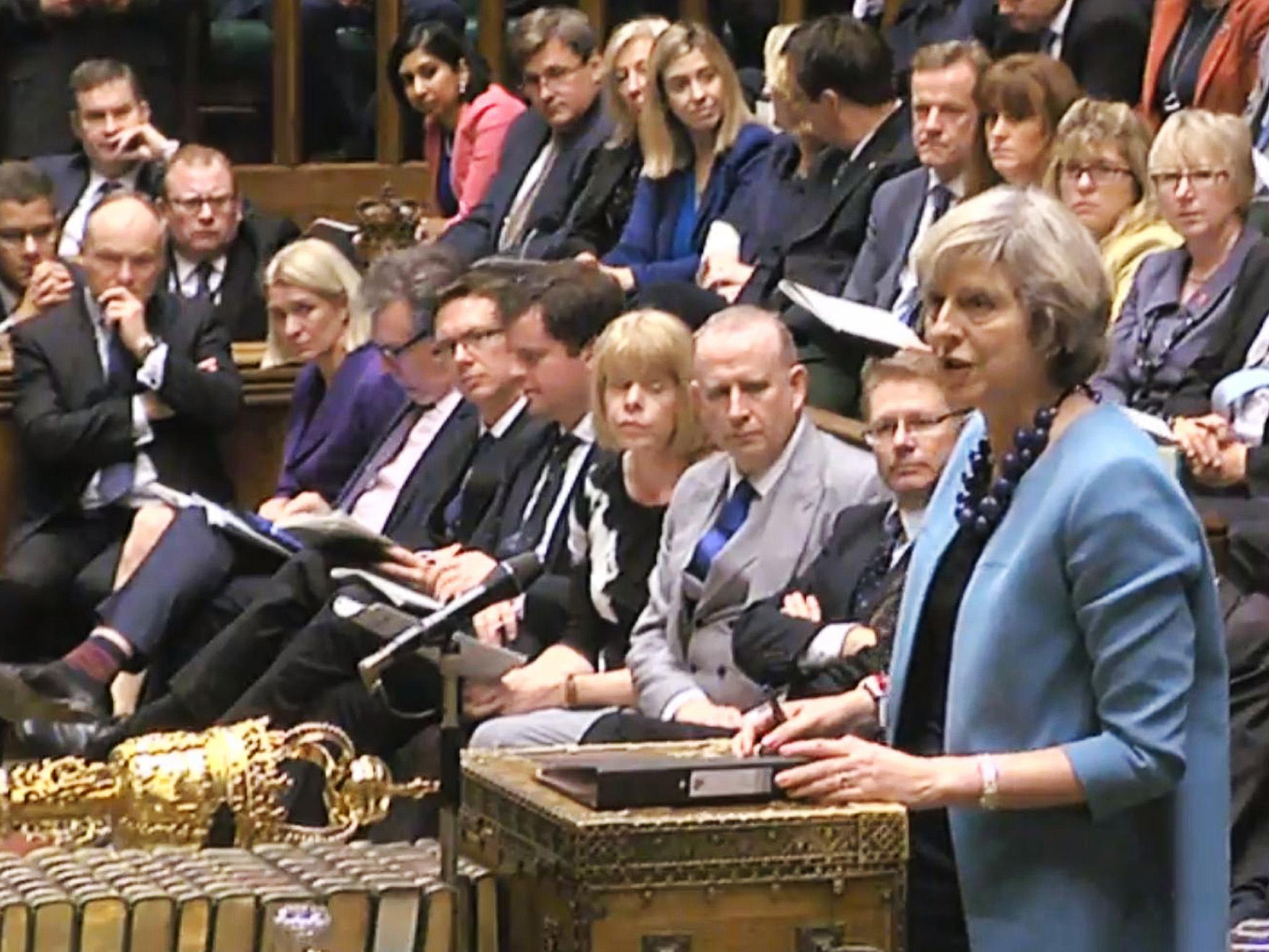 Theresa May speaks during Prime Minister's Questions in the House of Commons, London
