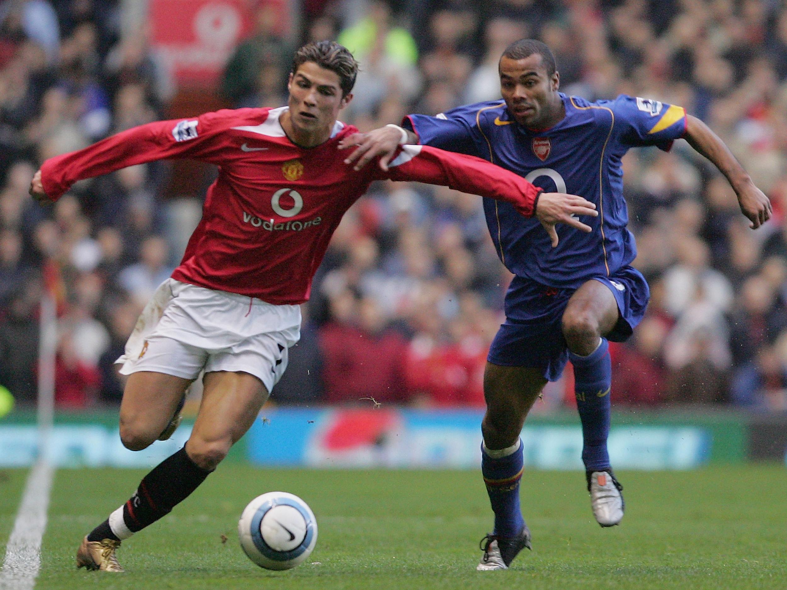 Cole and Ronaldo battle for the ball in 2004