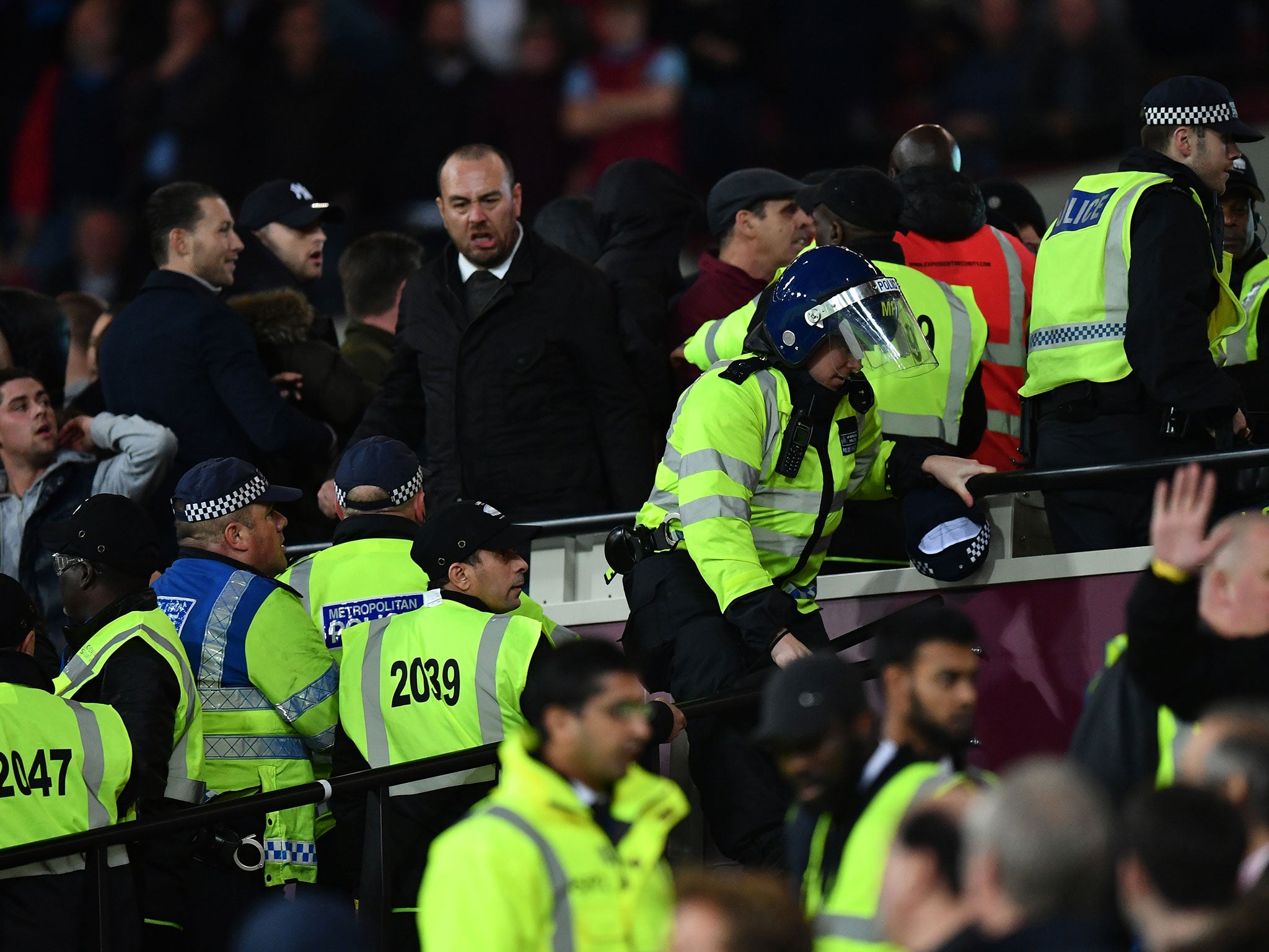 Security officers battled to maintain segregation within the ground