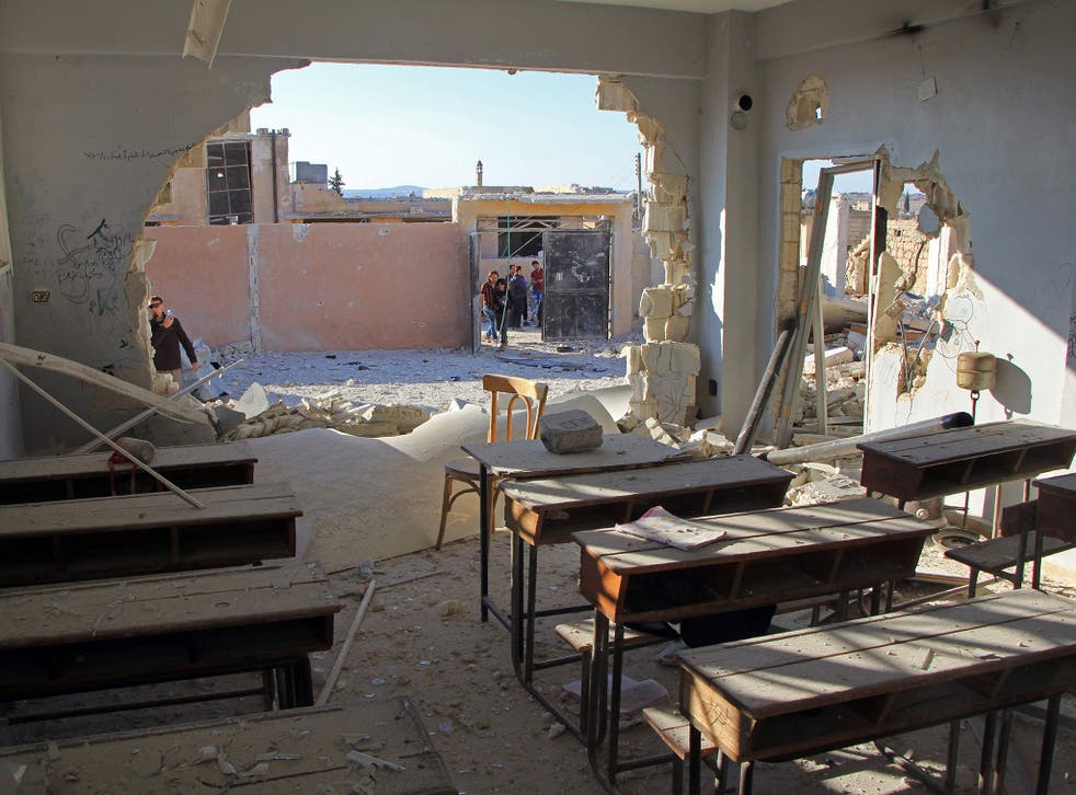 A damaged classroom at a school hit in an air strike in the village of Hass, in the south of Syria's rebel-held Idlib province on October 26, 2016