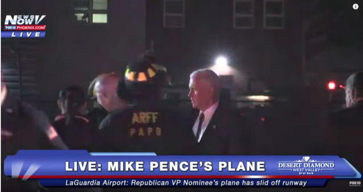 Mr Pence spoke to firefighters after he left the plane