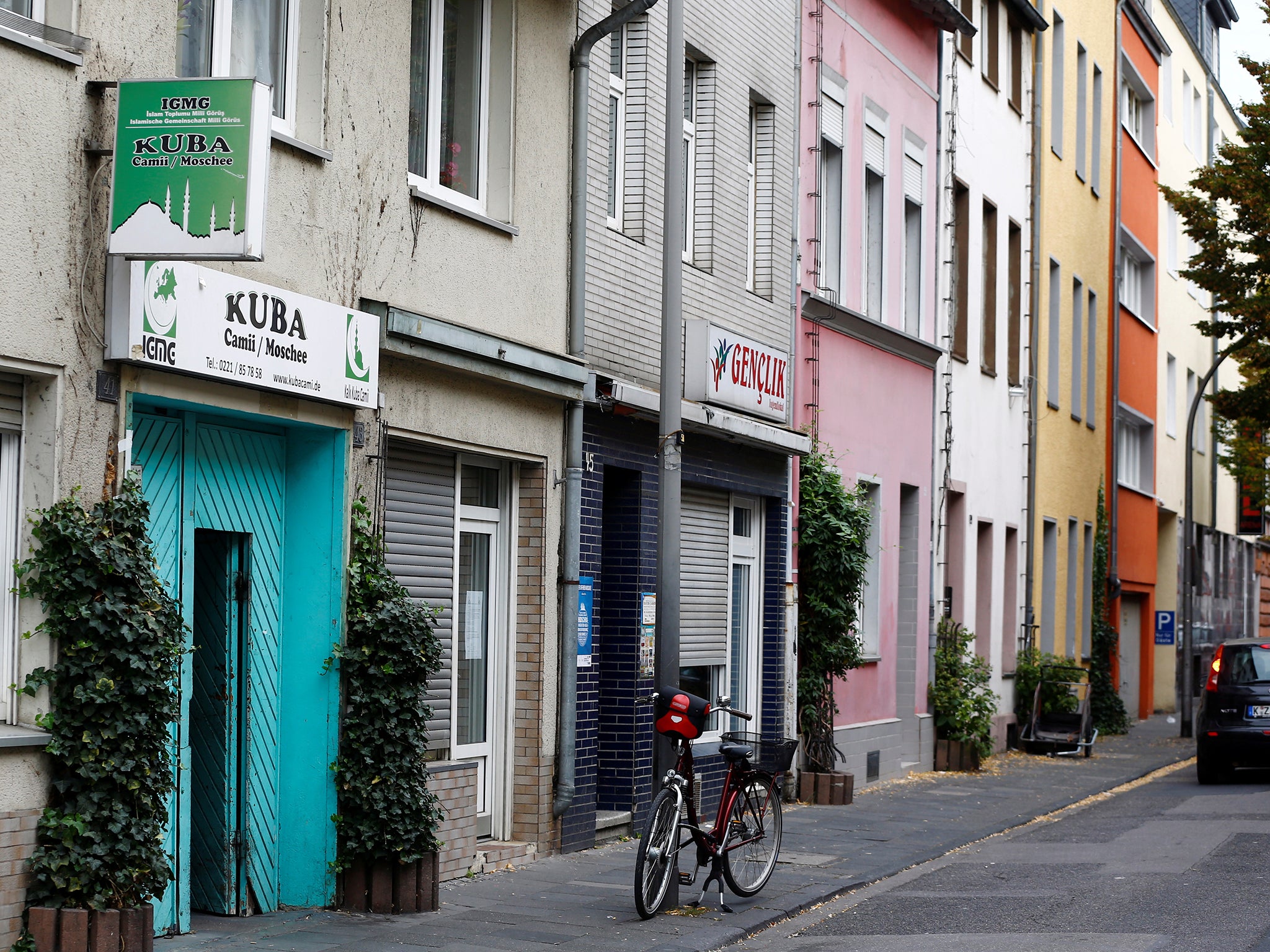 The Turkish Kuba Camii mosque near a hotel housing refugees in Cologne