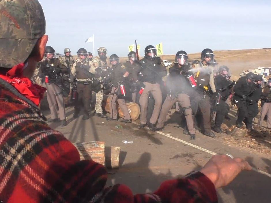 Police fire pepper spray at protesters during clashes over the North Dakota Pipeline on Thursday