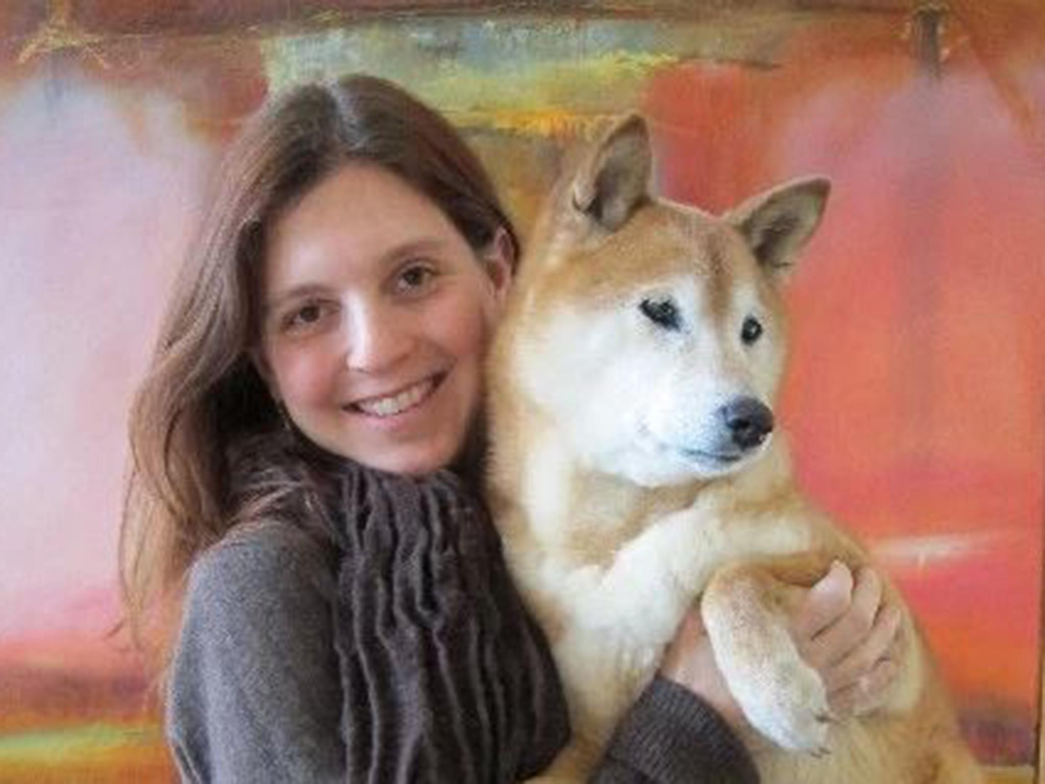Author Jennifer S Howard with her dog Tai which once saved a chameleon's life