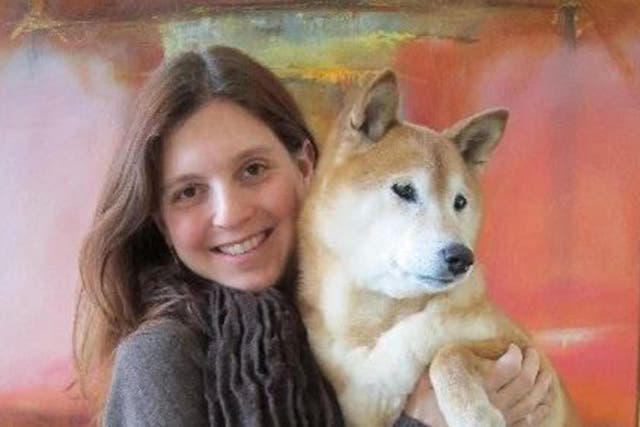 Author Jennifer S Howard with her dog Tai which once saved a chameleon's life