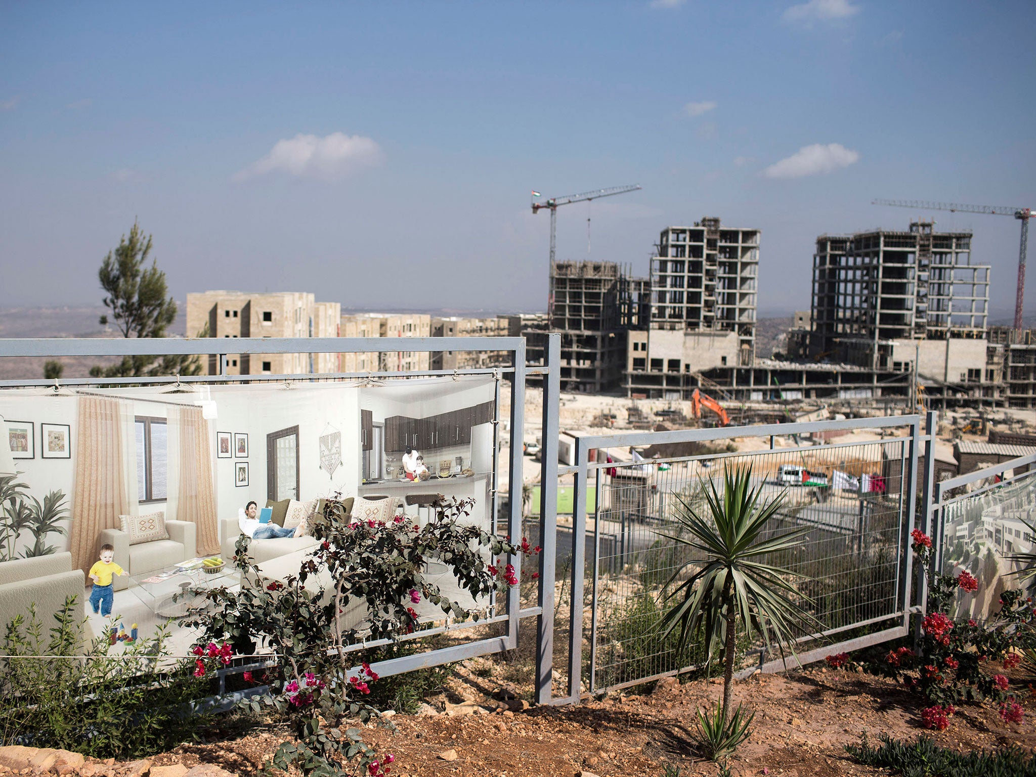 A poster in Rawabi, West Bank shows what future homes for Palestinians might look like