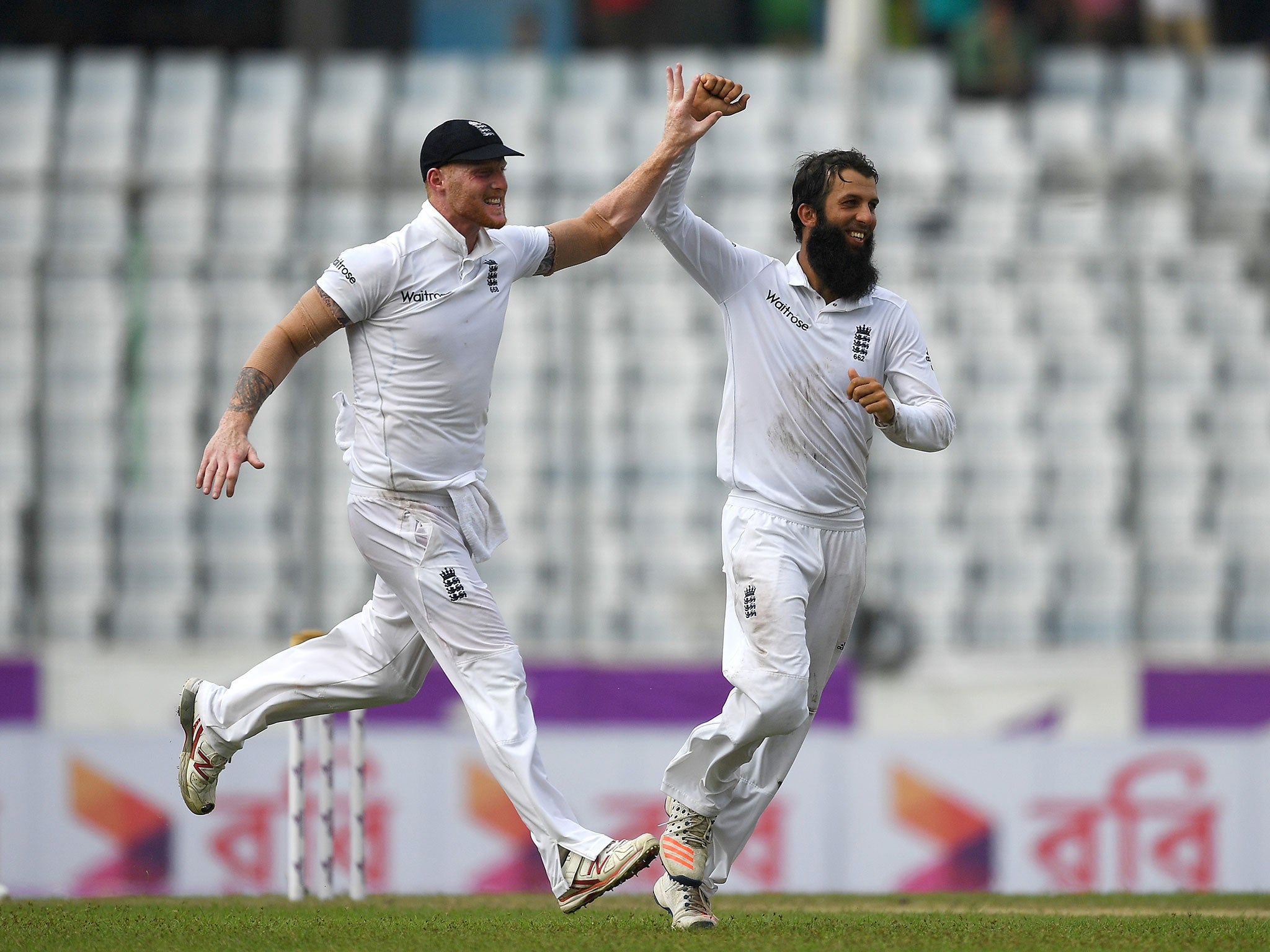 Ali celebrates with Ben Stokes after dismissing Bangladesh captain Mushfiqur Rahim