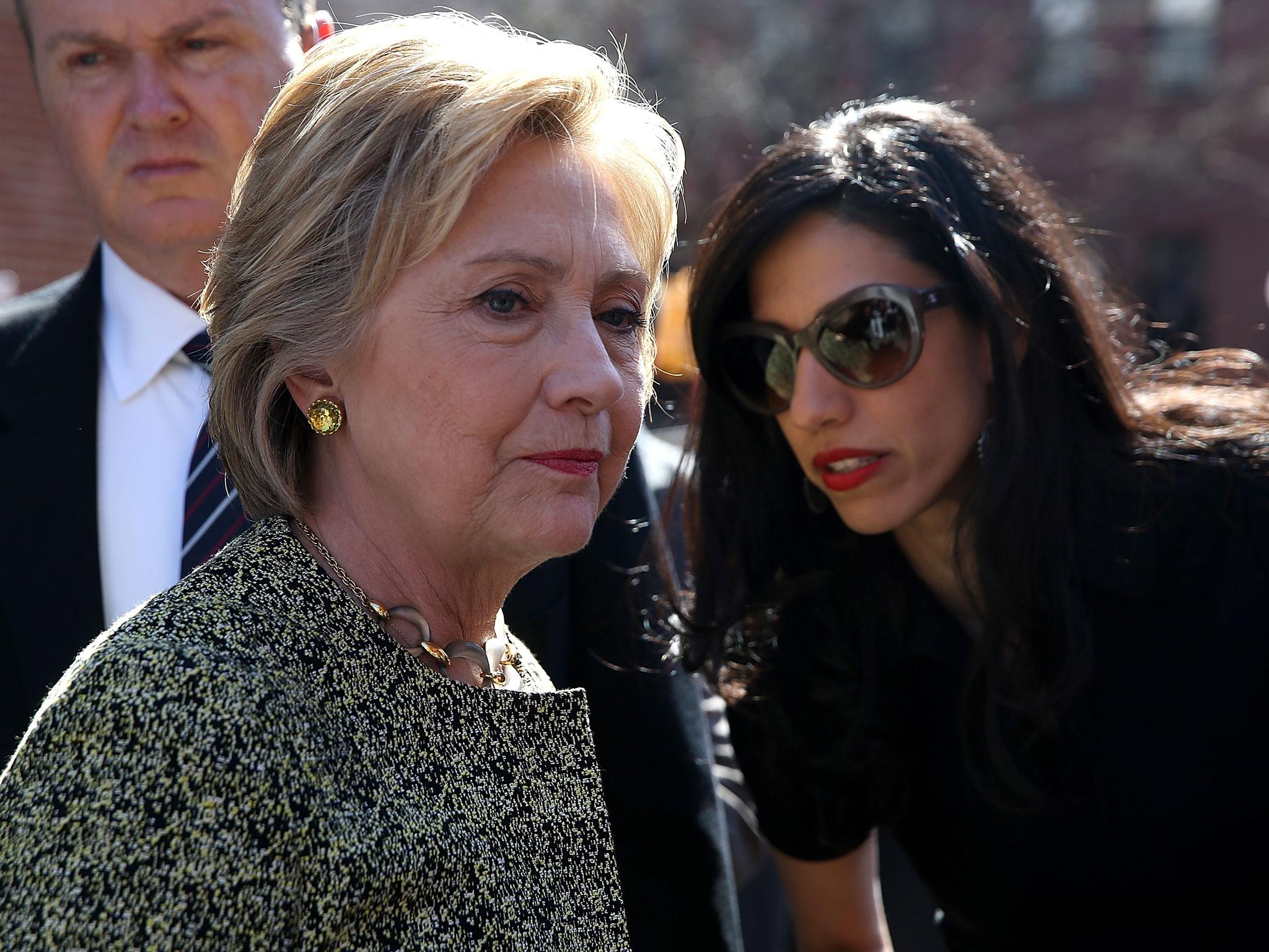 Ms Clinton and aide Huma Abedin Justin Sullivan/Getty