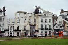 Oldest hotel in England collapses after fire rages for two days