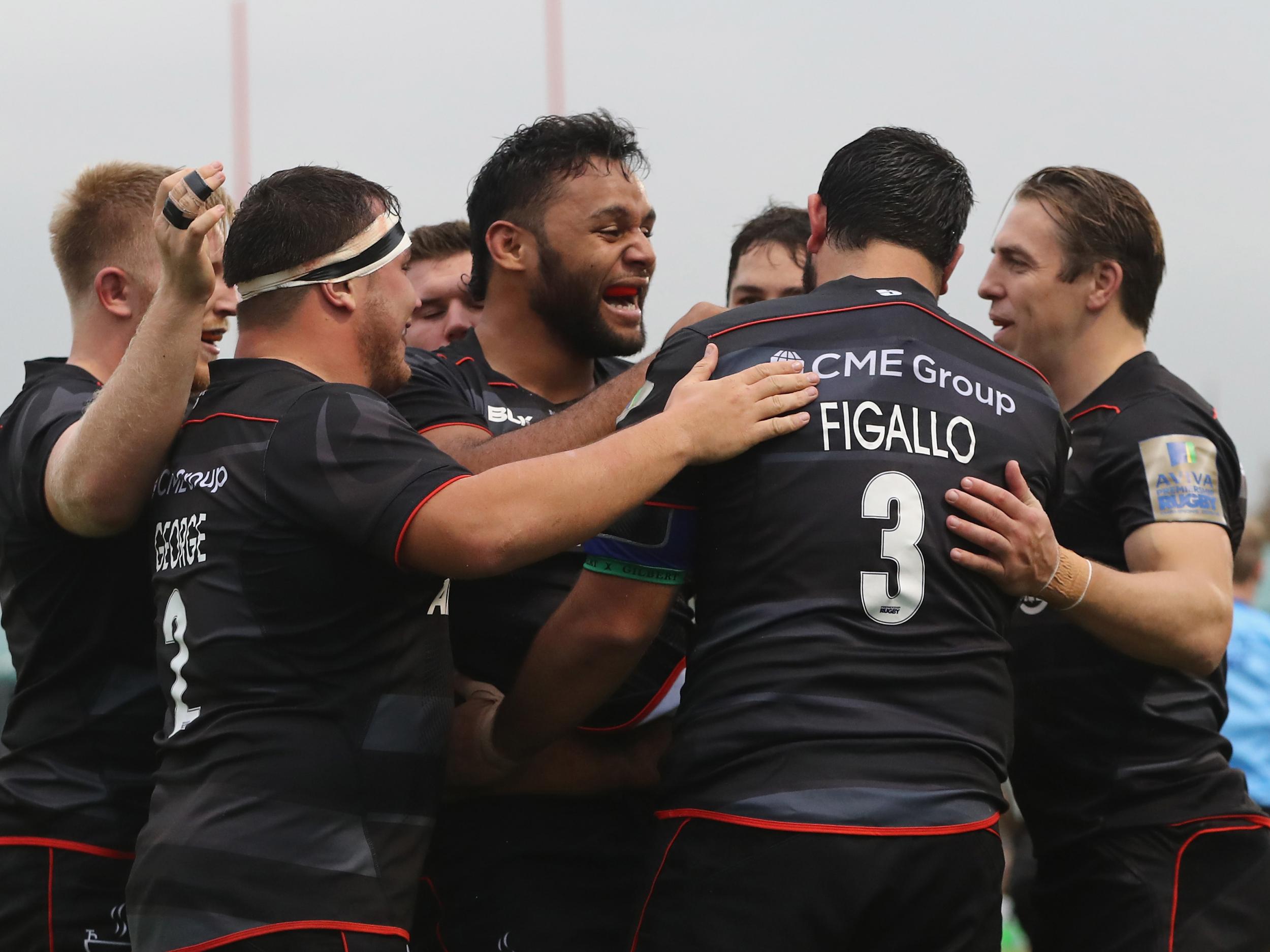 Billy Vunipola celebrates his try for Sarries