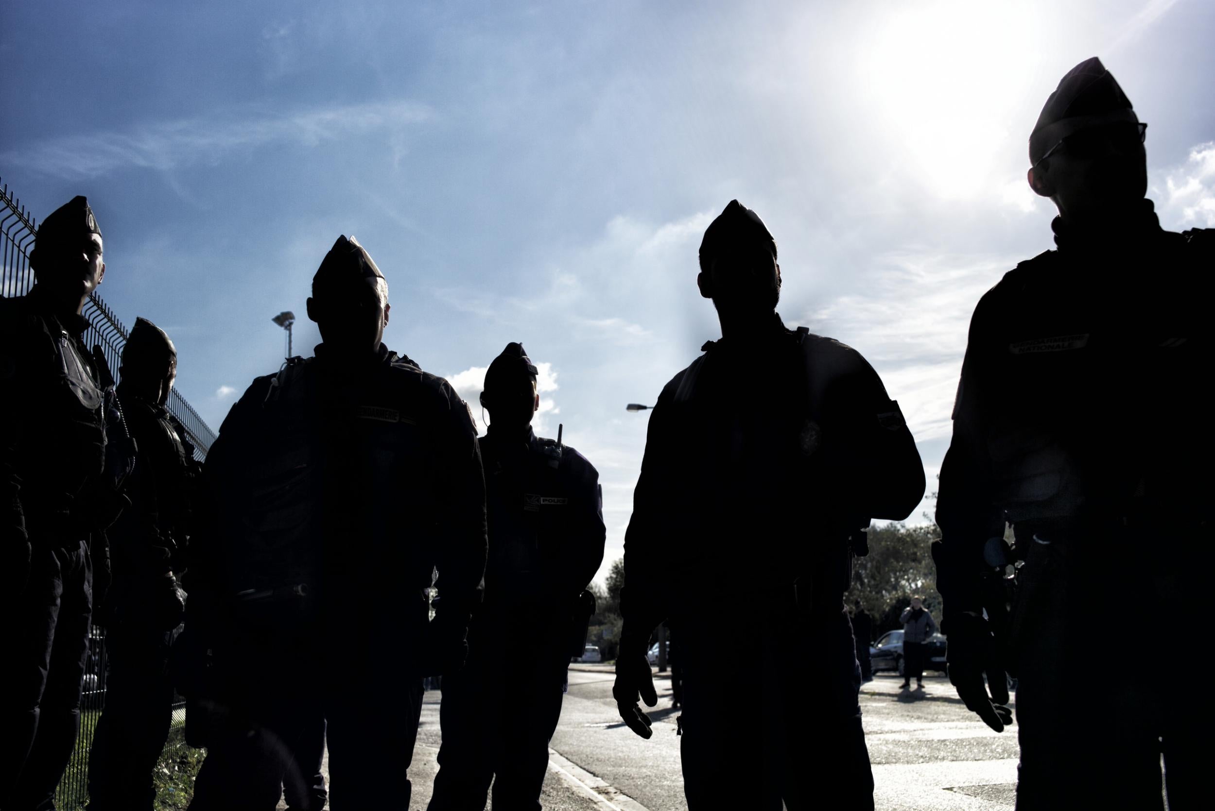 The gendarmes guarding the way to the buses (Photo: Emily Garthwaite)