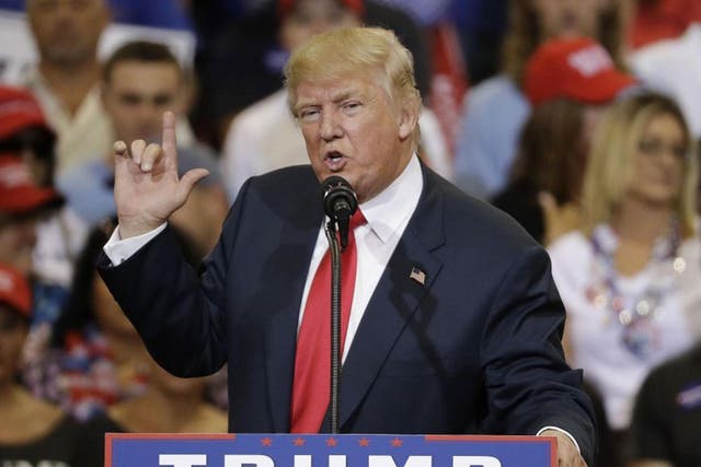 Republican presidential candidate Donald Trump speaks at a rally in Phoenix