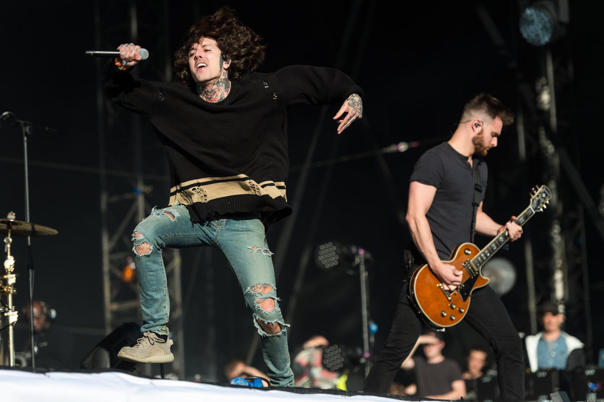 Oliver Sykes of 'Bring Me The Horizon' performs on the Other Stage during the Glastonbury Festival at Worthy Farm, Pilton on June 24, 2016 in Glastonbury, England