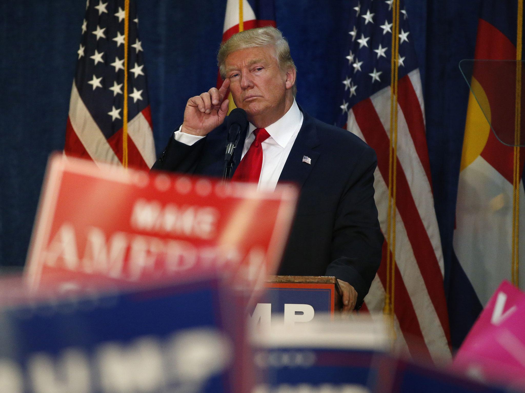 Donald Trump, speaking at a campaign rally at the University of Northern Colorado, says the emails scandal is 'bigger than Watergate' AP