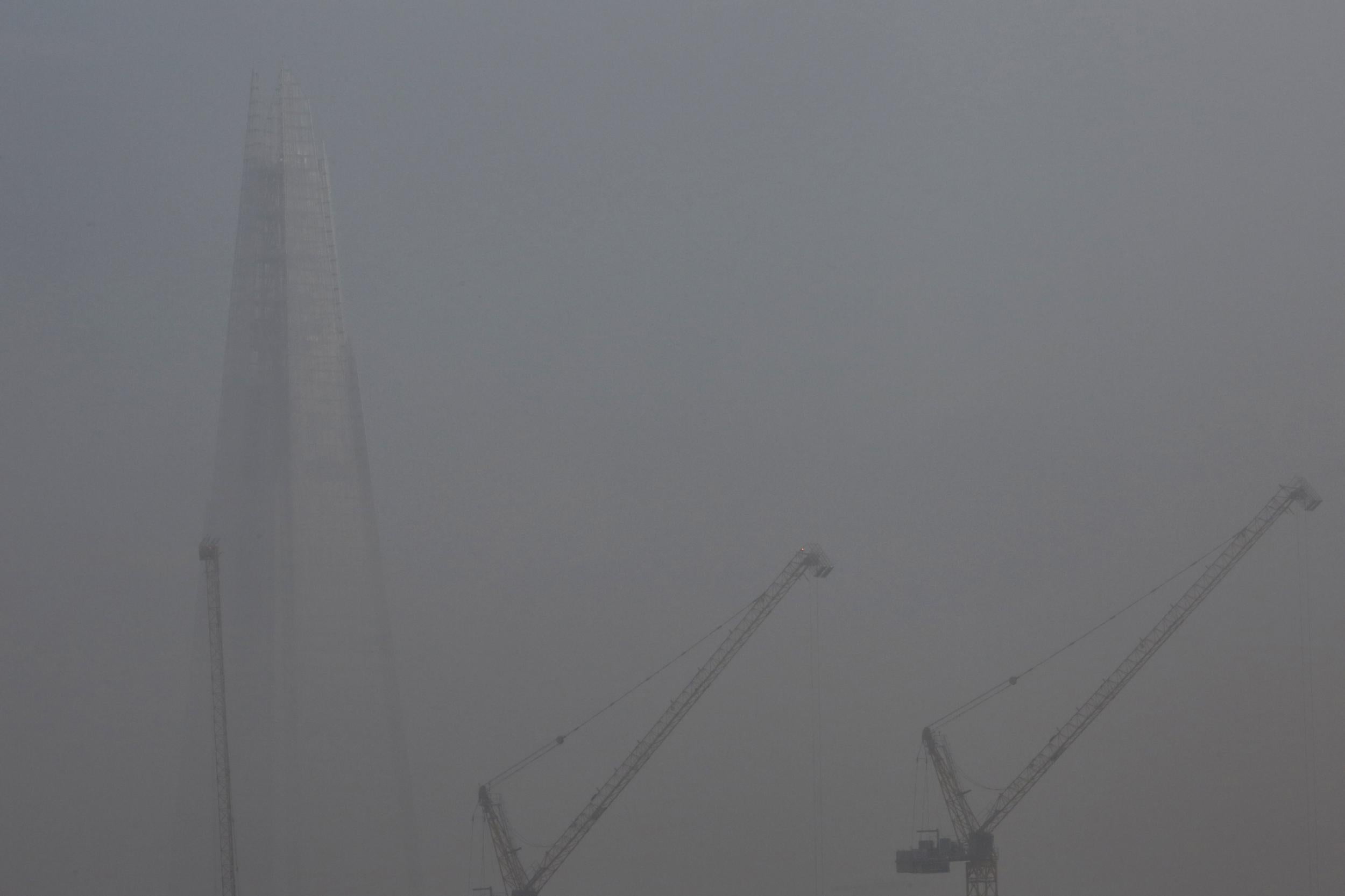 Fog surrounds London's Shard building
