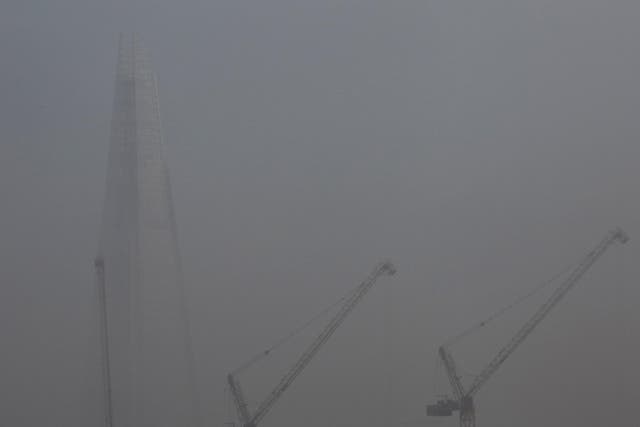 Fog surrounds London's Shard building