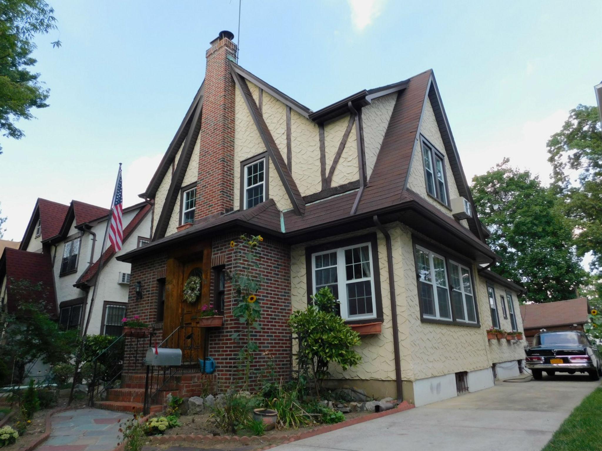 The stucco, tudor house is on the market for $1.25 million