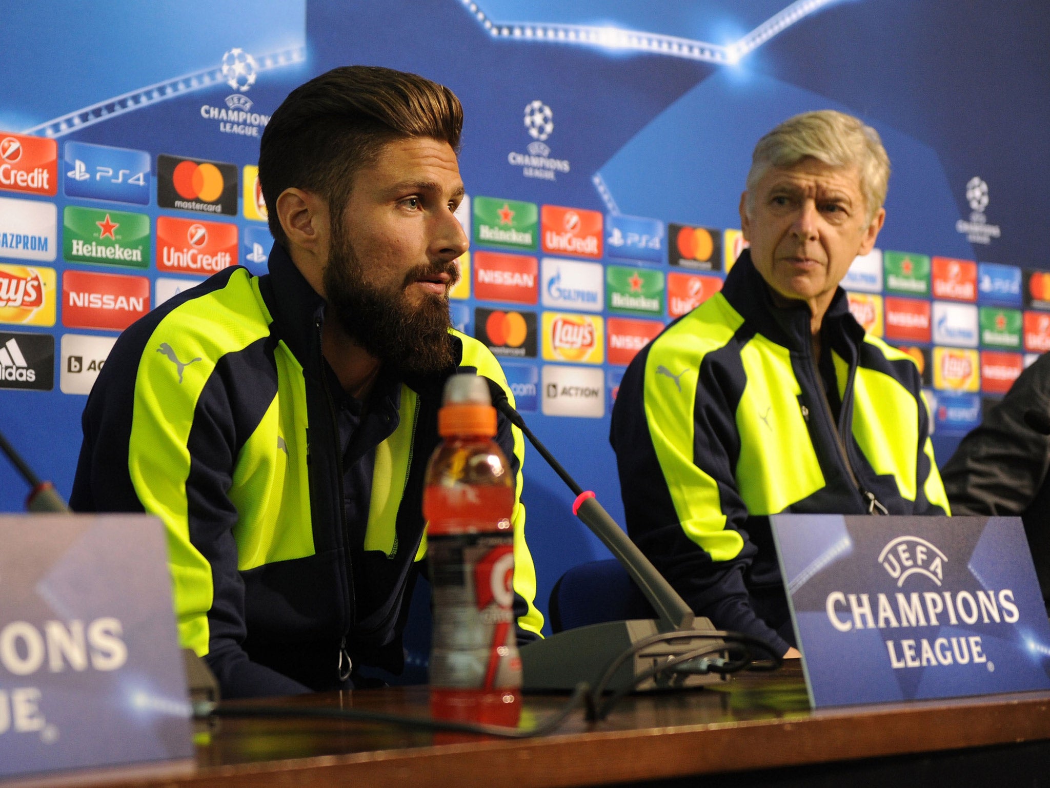 Olivier Giroud insists he is happy to wait to win his place back in the Arsenal first team