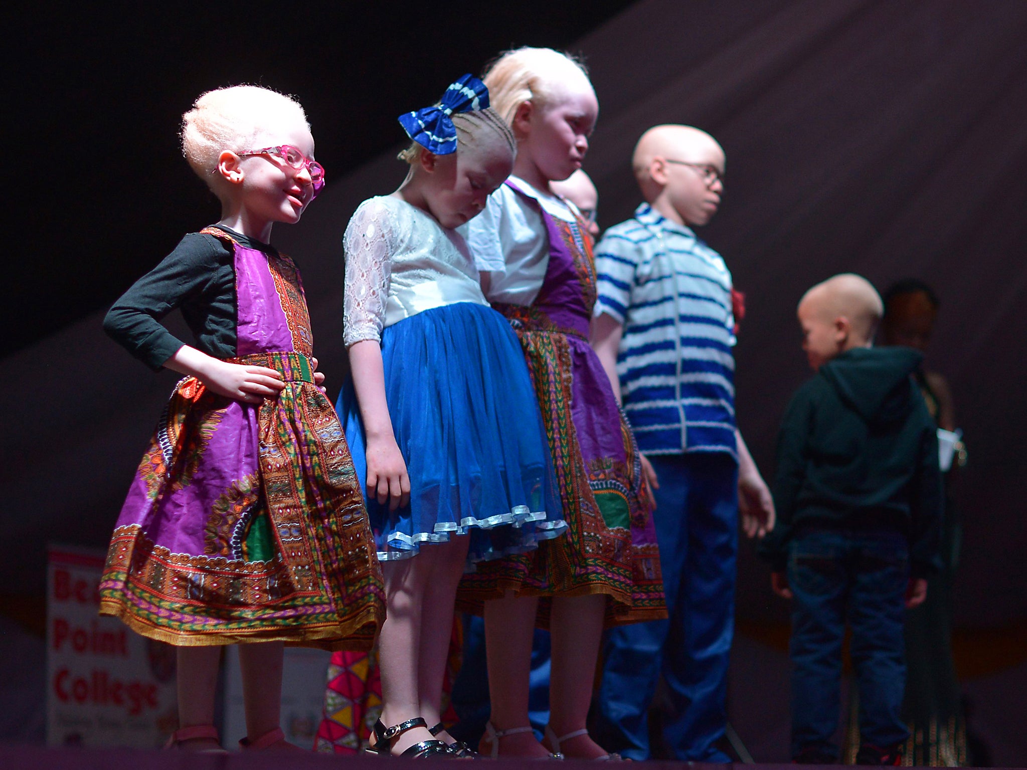 Children stand on stage during a pageant hosted by the Albinism Society of Kenya in Nairobi