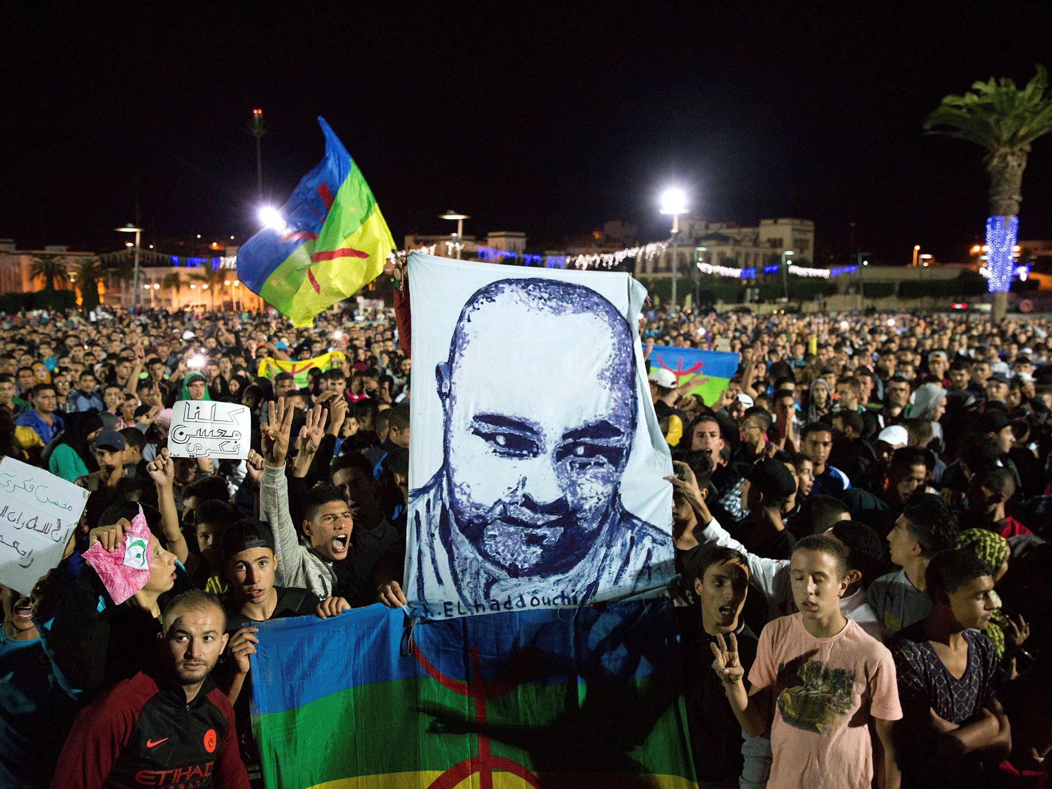Protesters take part in a rally after the death of Mouhcine Fikri