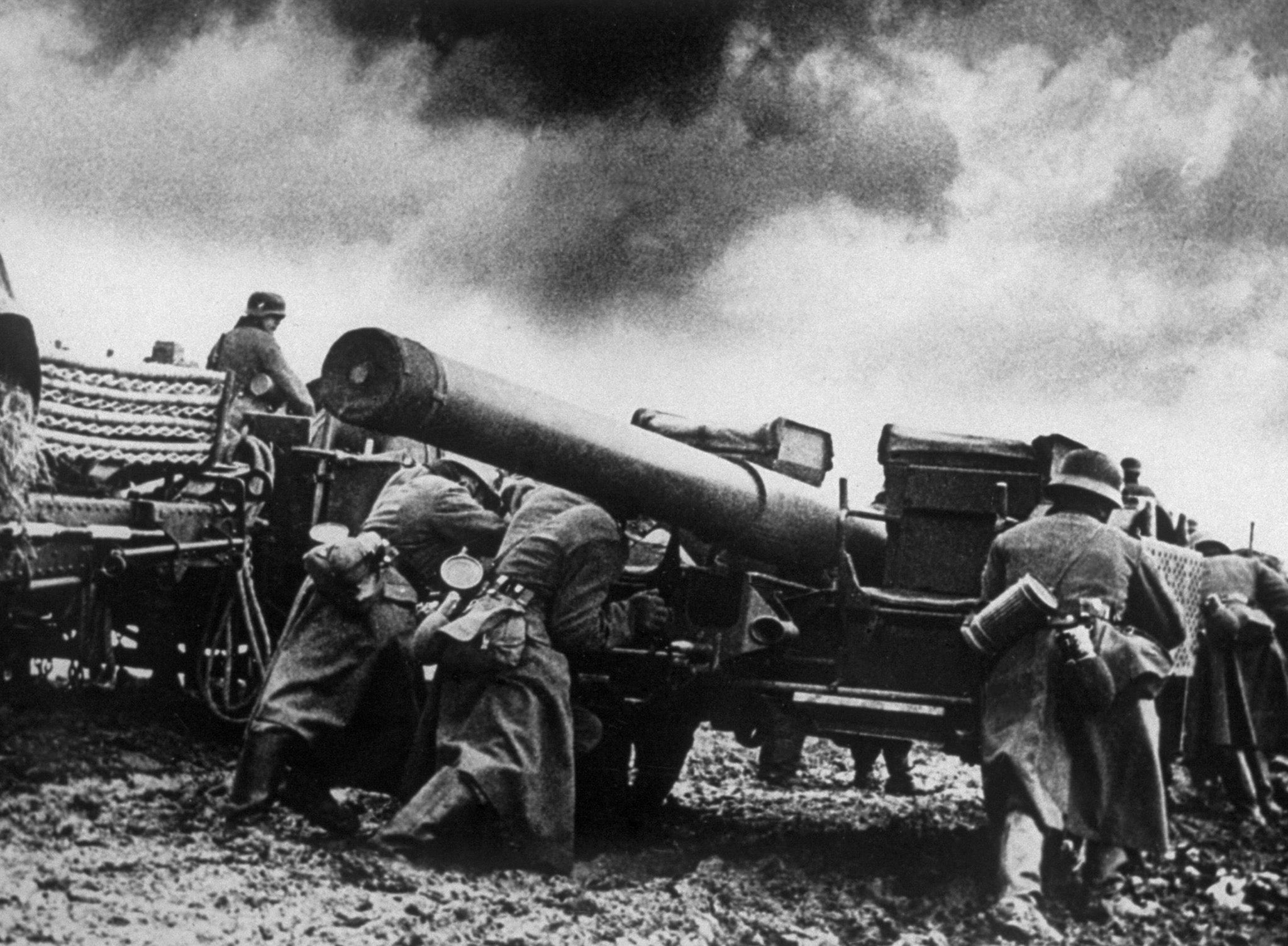 Nazi troops setting up their big guns on one of the many battle fronts in Norway