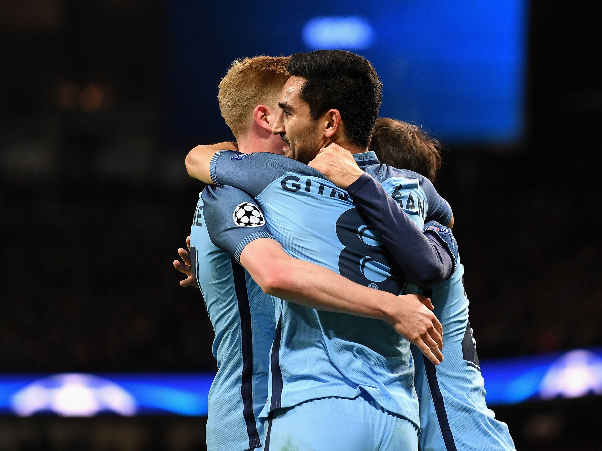 Ilkay Gundogan celebrates with teammates after putting Manchester City 3-1 up