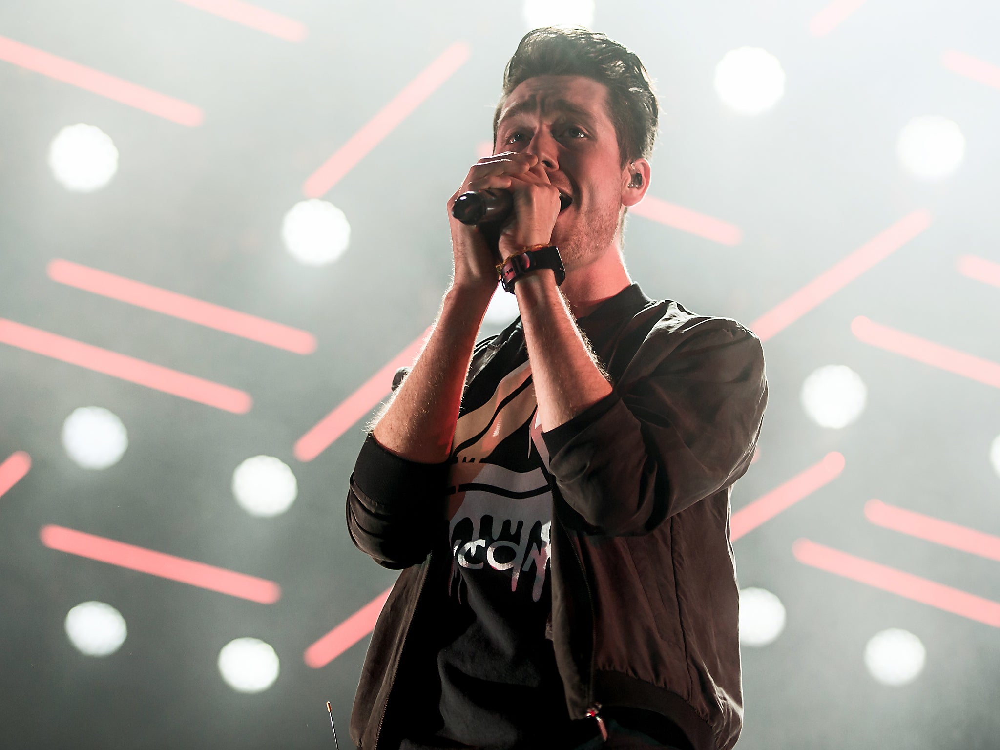 Dan Smith performs with Bastille at the O2 Arena, London