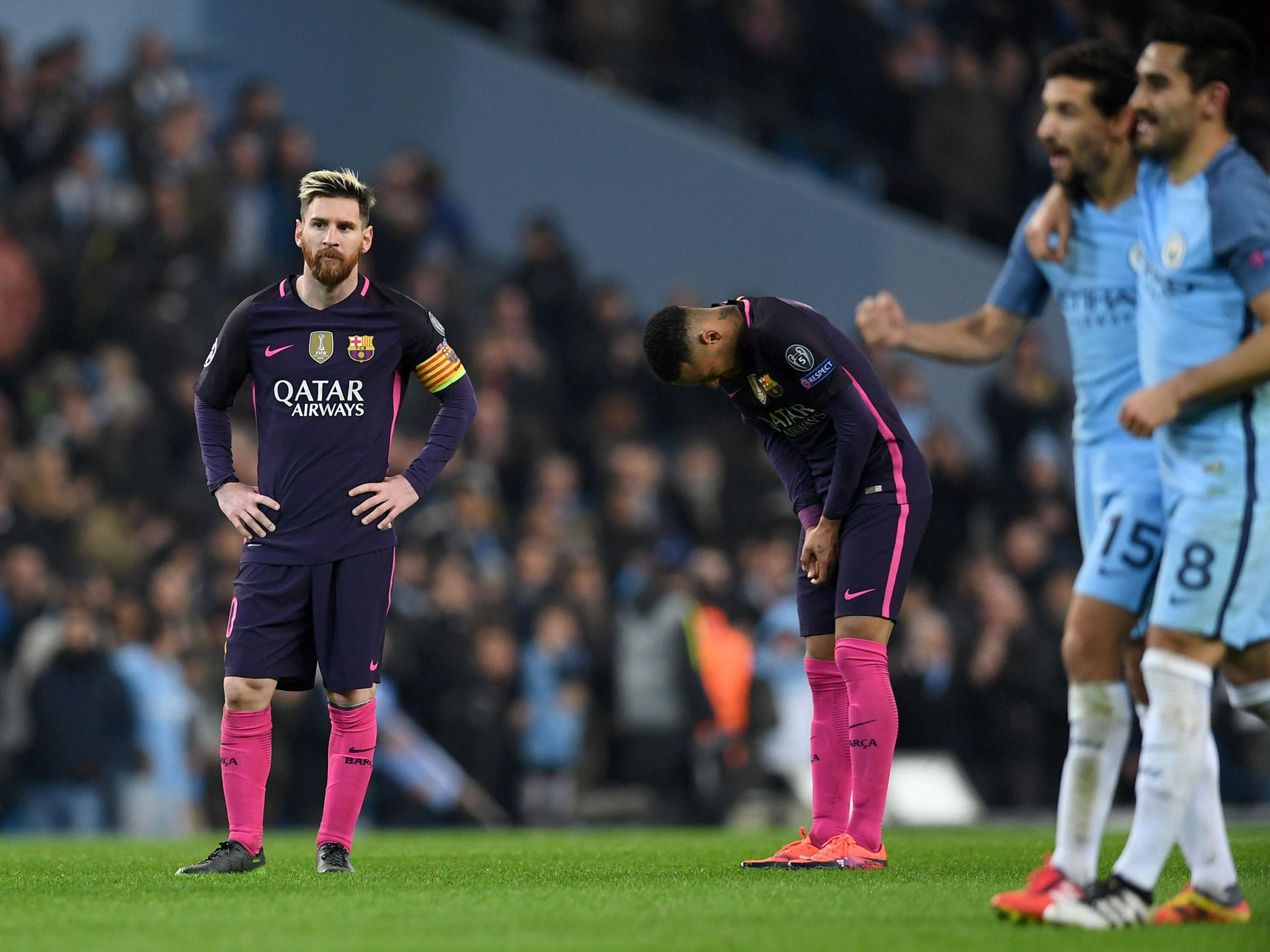 Lionel Messi reacts after seeing Manchester City secure a 3-1 victory over Barcelona