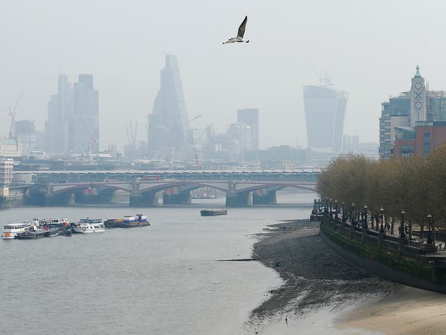 The London skyline appears veiled in smog. The city is breaking WHO limits for nitrogen dioxide