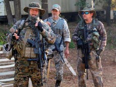 The armed militia training in the woods ready for a Clinton win
