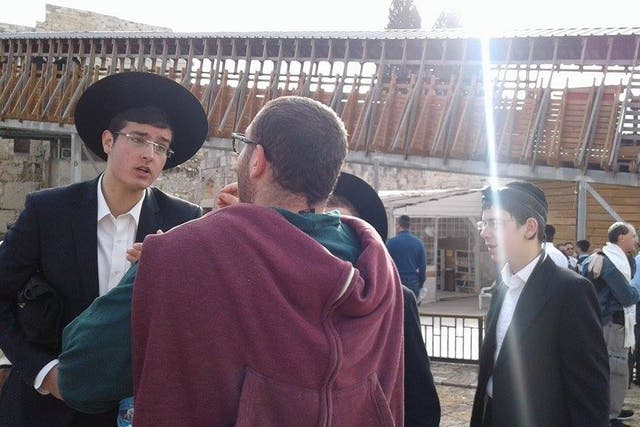 Elyahu Lopianski, left, says female rabbis should never be allowed to pray at the Western Wall