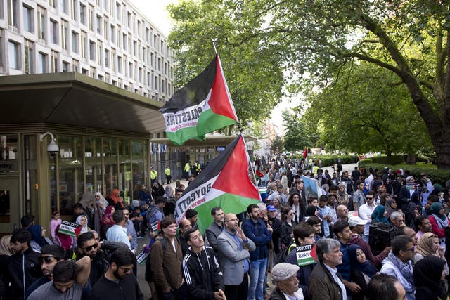 Pro-Palestinian BDS movement supporters take part in a rally in central London