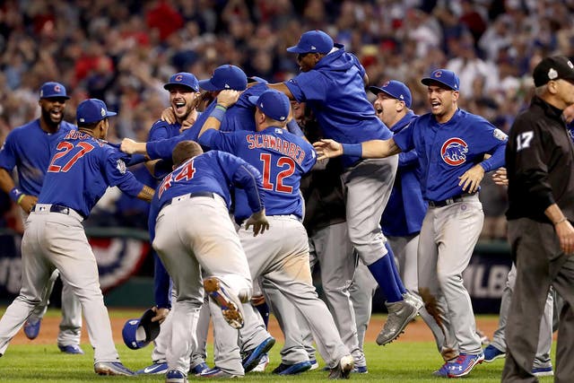 Chicago Cubs players celebrate winning the World Series