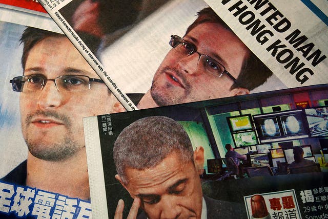 Edward Snowden on the front pages of local English and Chinese newspapers after the NSA contractor leaked details of US surveillance programmes.