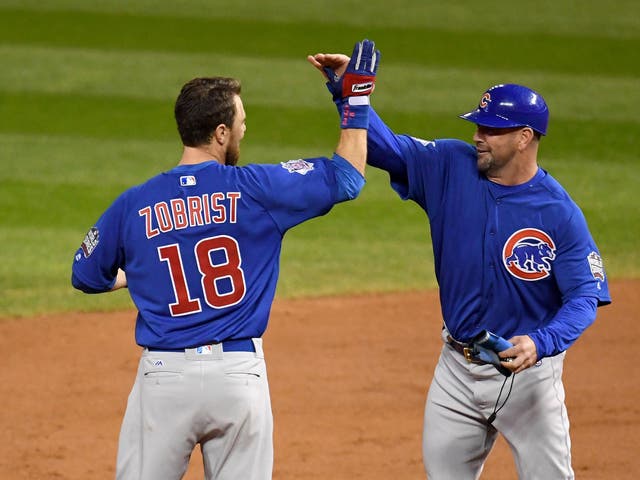 Ben Zobrist celebrates the Chicago Cubs' World Series win with Brandon Hyde