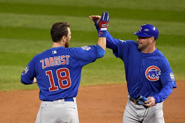 Ben Zobrist celebrates the Chicago Cubs' World Series win with Brandon Hyde