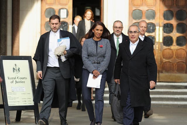 Gina Miller (C) leaves after the High Court decides that the Prime Minister cannot trigger Brexit without the approval of the MP's at The Royal Courts Of Justice