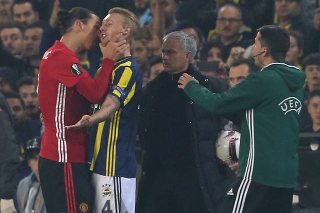 Ibrahimovic grabs Kjaer by the throat during United's 2-1 defeat
