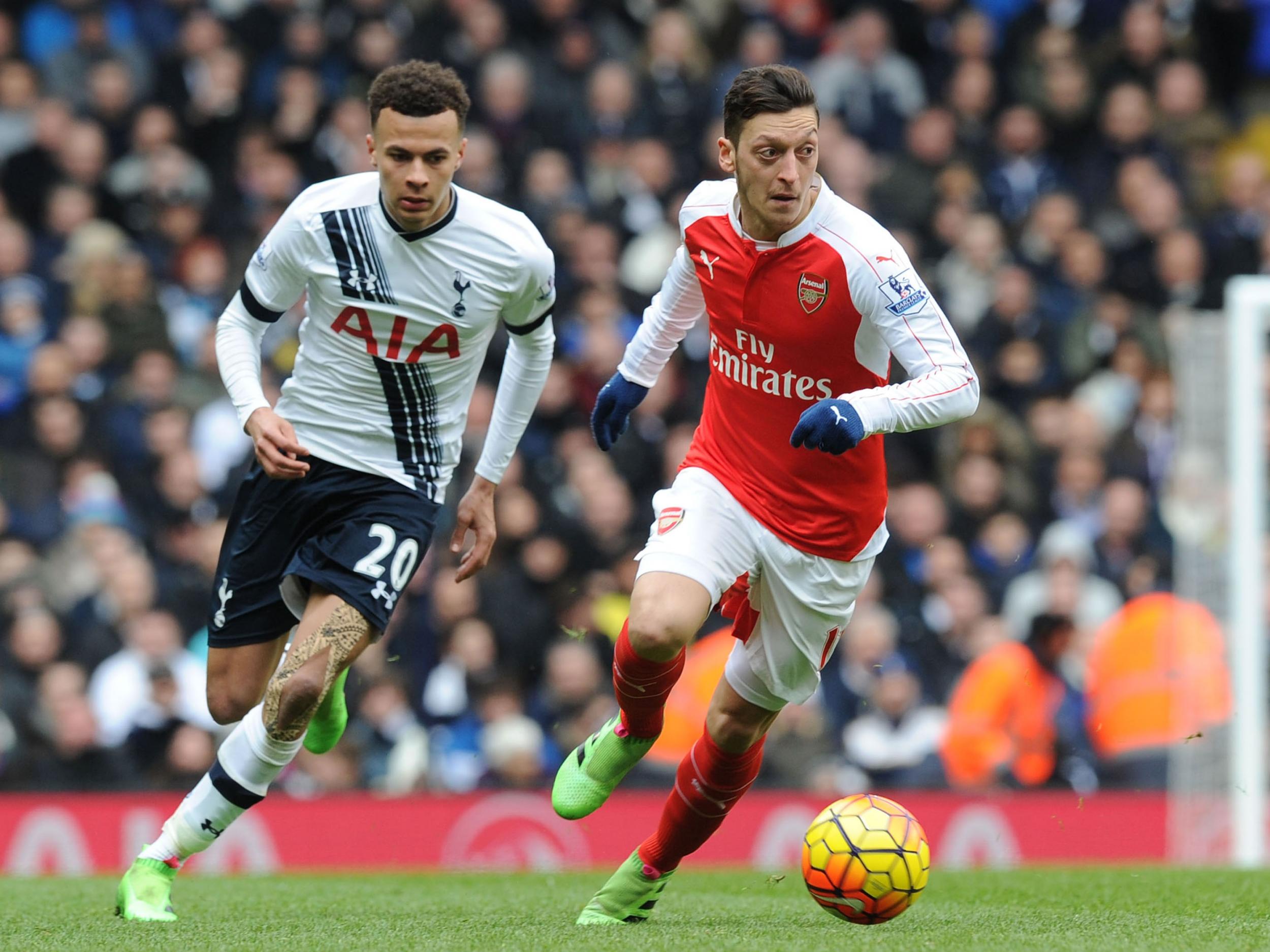 Dele Alli chases down Mesut Ozil in last season's encounter