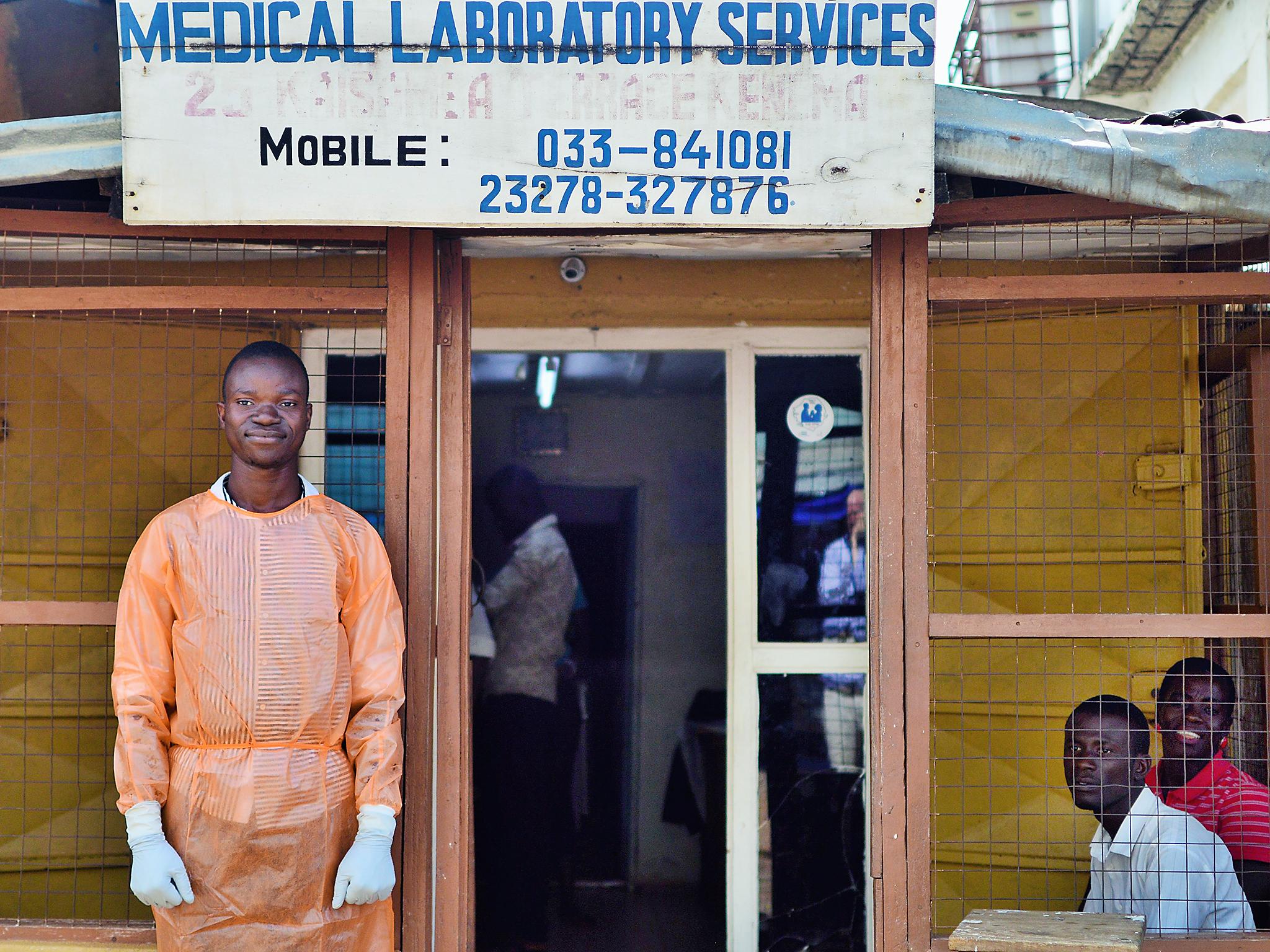 Douda runs a clinic that used to be run by his father who died of Ebola (Olivia Acland/Street Child)