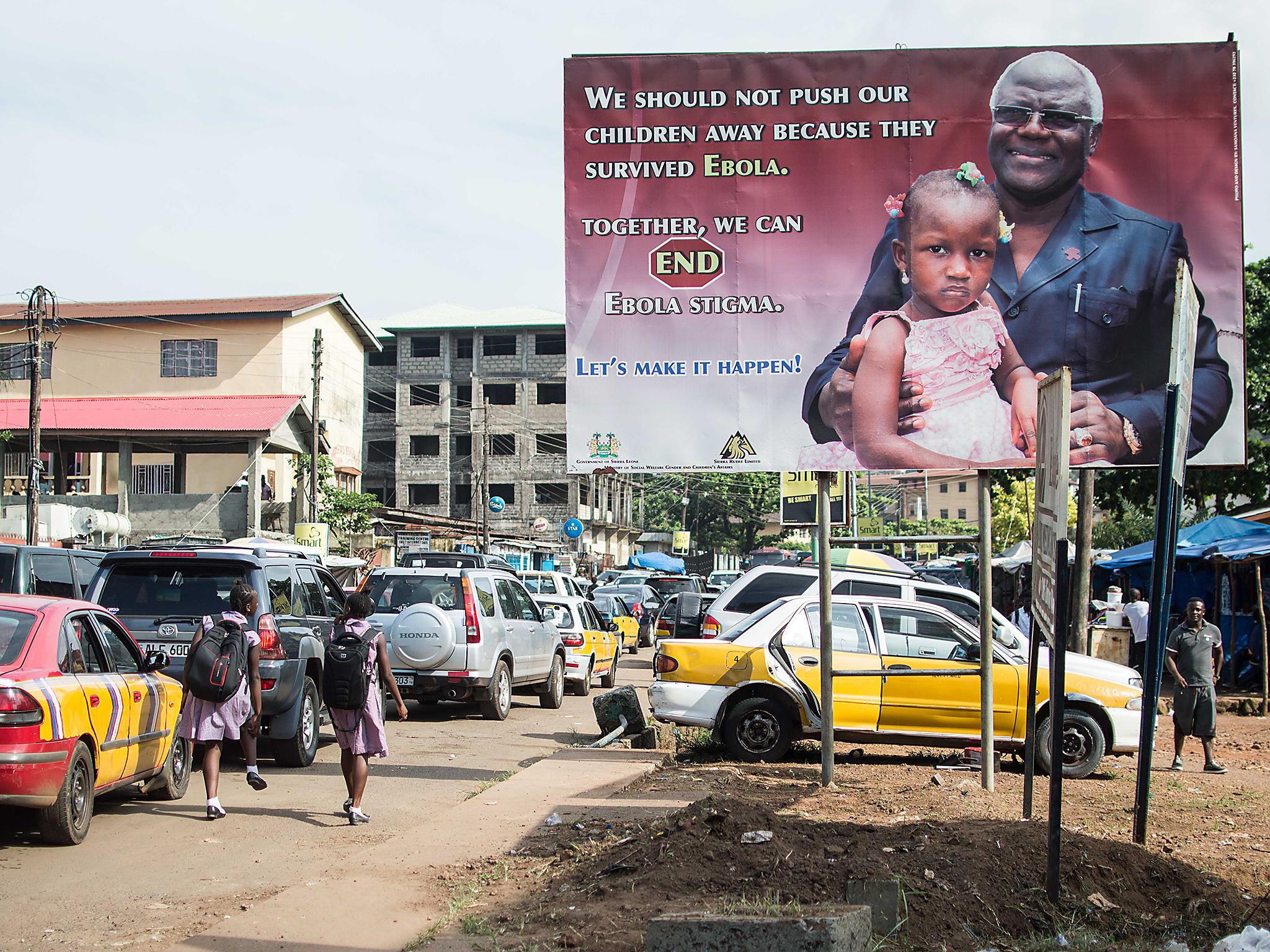 Posters remind people not to reject orphans of Ebola in Sierra Leone (Olivia Acland/Street Child)