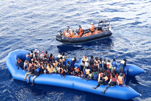A refugee boat carrying 101 people being rescued by MSF earlier this year