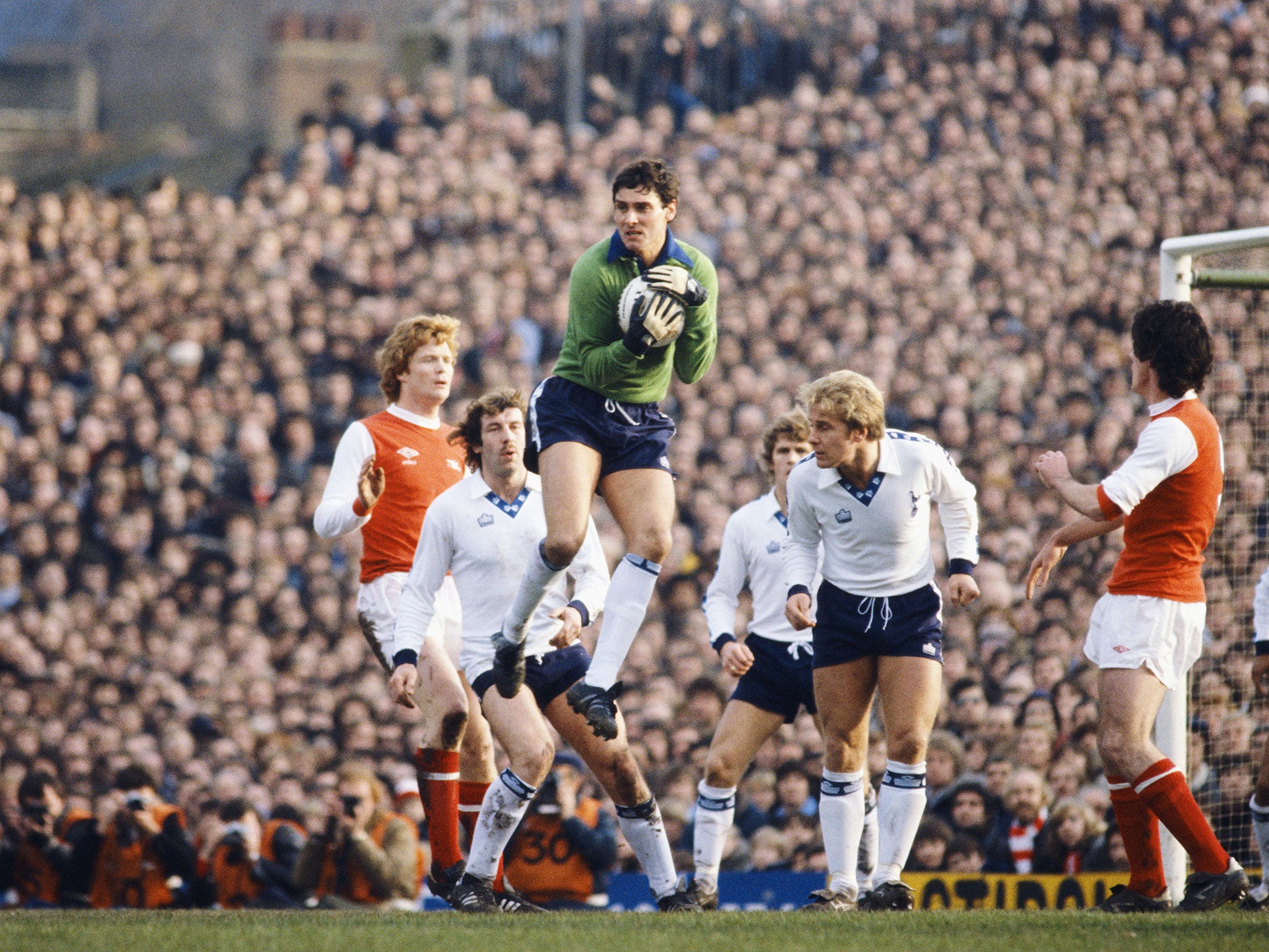 Spurs goalkeeper Milija Aleksic claims a cross watched by Arsenal players Willie Young (l) and Frank Stapleton (r) alongside Spurs players Gerry Armstrong (2nd left) and Don McAllister (2nd right) during a First Division match between Arsenal and Tottenham Hotspur at Highbury on December 26, 1979