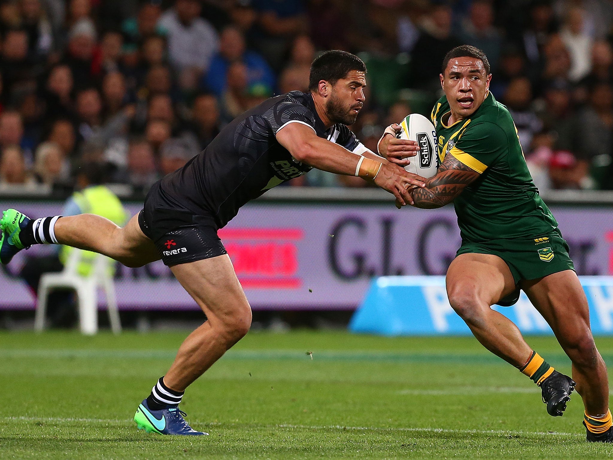 Tyson Frizell looks to avoid being tackled by Jesse Bromwich during the International Rugby League Test match between the Australian Kangaroos and the New Zealand Kiwis on October 15, 2016