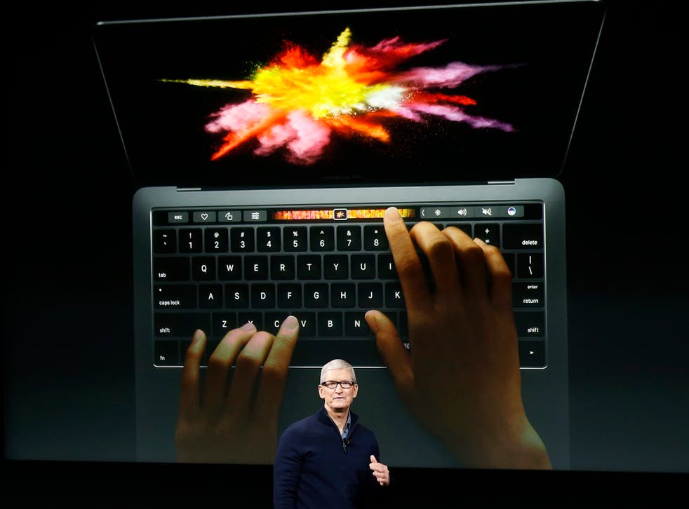 Apple chief executive Tim Cook unveils the latest Macbook Pro range during an event at the Apple Headquarters in Cupertino, California