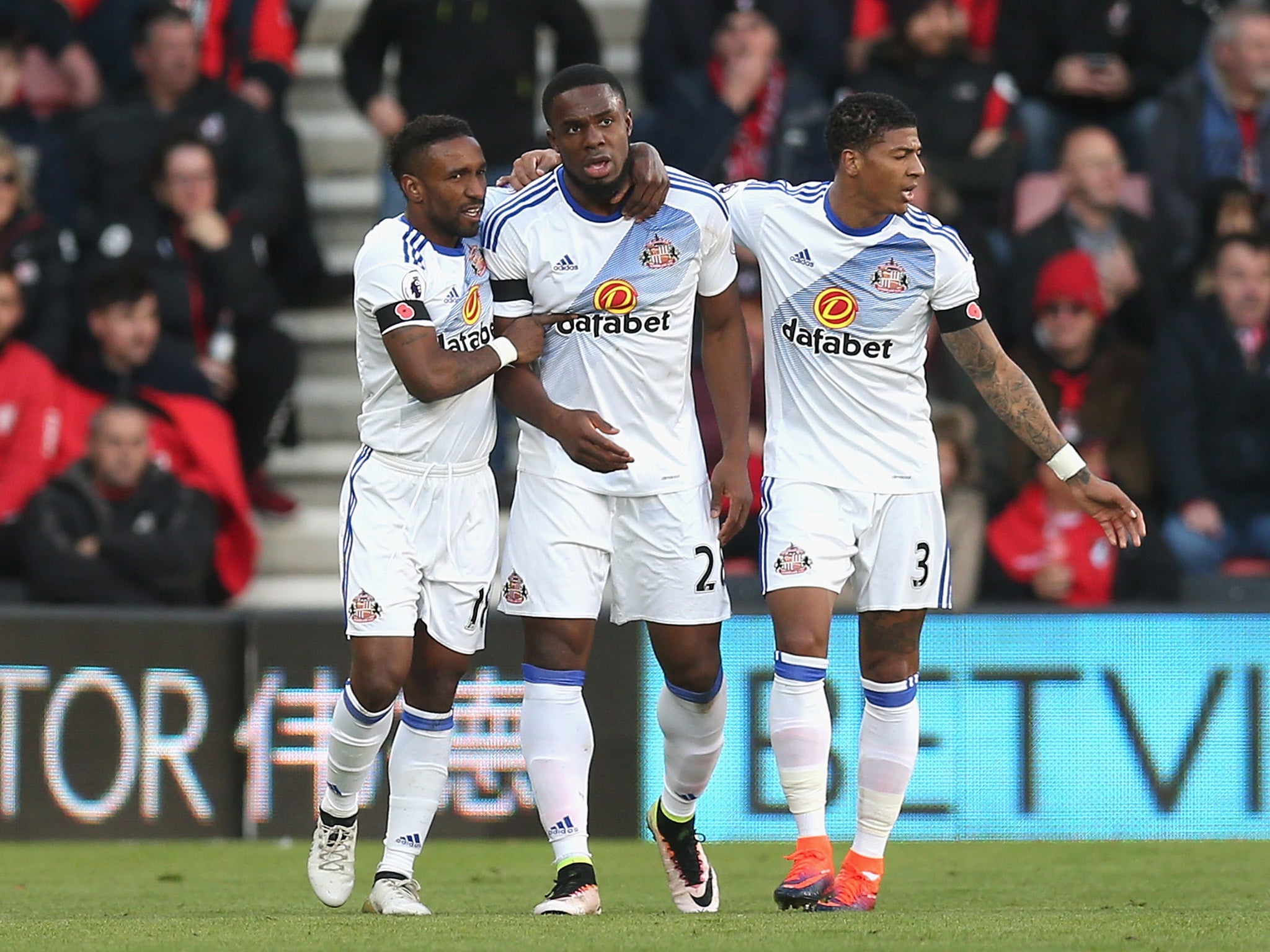 Victor Anichebe celebrates with his teammates after scoring against Burnley