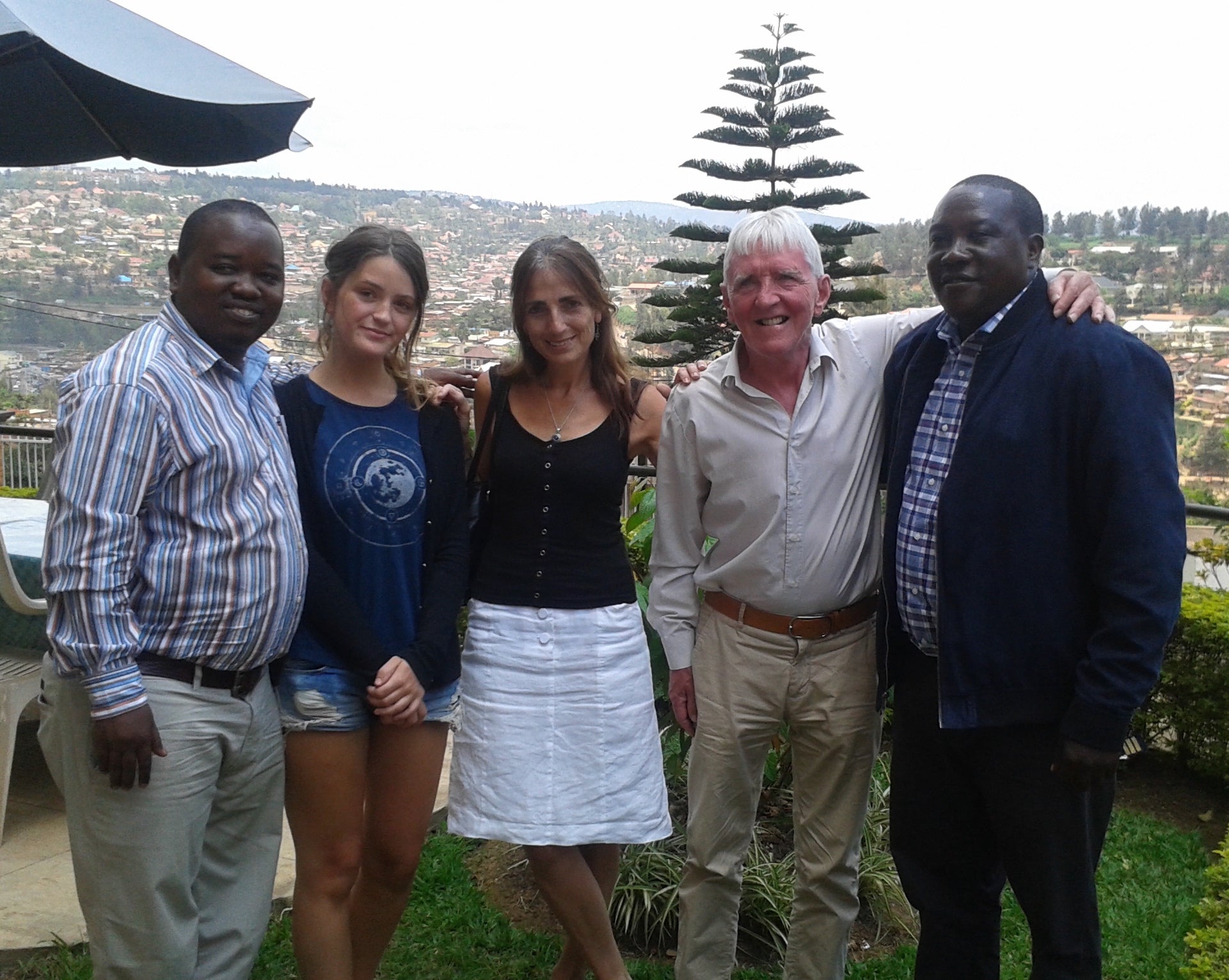 From right to left: JMV Gatabazi MP, Tim Murphy, Wendy Murphy, Ellie Murphy, and a Rwandan official