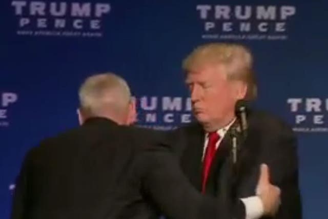 Secret Service agents stormed the stage to bundle the Republican candidate away from the alleged threat